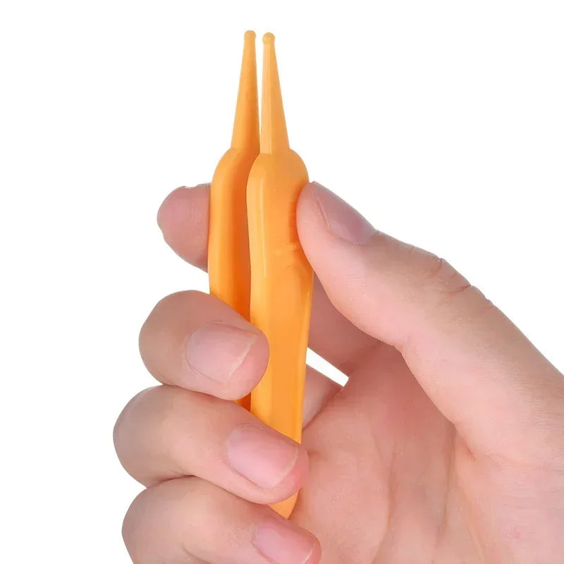 Baby Nasal Tweezers Nose And Ear Cleaner Plastic Pincet Clip Safety Cleaning